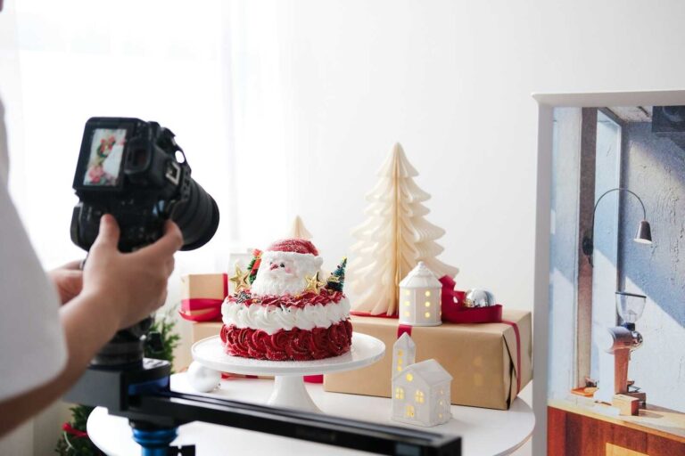 Photographing a festive Christmas cake setup with holiday décor for a creative holiday gig.